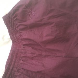 Burgundy Reebok track pants